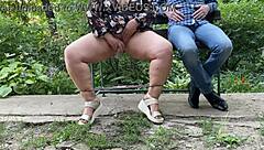 MILF's wet pussy nectar flashes outdoors in miniskirt