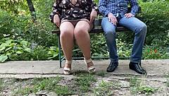 MILF's wet pussy nectar flashes outdoors in miniskirt