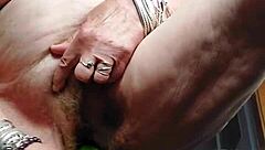 granny fucks her wild hairy pussy hard!