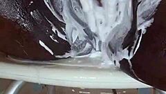 Black milf shaves her wet pussy close-up for homemade fun