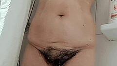 stepmom teases with her sexy hairy pussy show