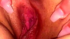 Pretty pink pussy freak creams wildly on fingering!