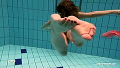 big tits silvie dives in pool flashing her hairy beaver!