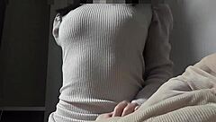 Cute Japanese girl practices riding position solo in bedroom