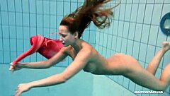 big tits silvie dives in pool flashing her hairy beaver!