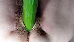 german granny stuffs hairy pussy with dildo cucumber