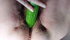 german granny stuffs hairy pussy with dildo cucumber