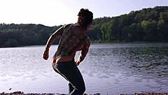 curvy brunette flashes thong bodysuit at lake beach
