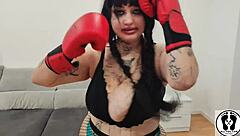 Chubby babe's bouncing boobs during boxing workout