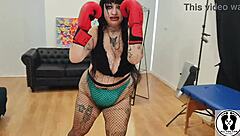 Chubby babe's bouncing boobs during boxing workout