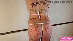 crazy hubby writes kinky words on bound wife's body?