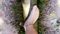 barefoot nylon tease balances outdoors in sheer pantyhose thrill