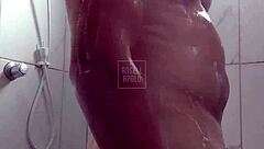 Masked tattooed stud showers toys to cum