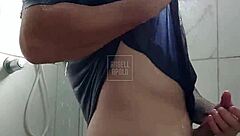 Masked tattooed stud showers toys to cum