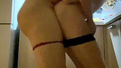 Hey, you watching this milf pound her young lover hard in the kitchen missionary style?