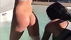 Horny Tattooed Lesbians Lick Big Tits in Jacuzzi Bliss