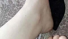 gretala rubs thong on sexy barefoot ebony feet