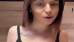 girl struts around braless with her massive tits bouncing in tight tanktop