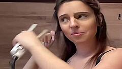 girl struts around braless with her massive tits bouncing in tight tanktop