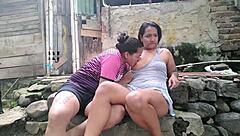 colombian lesbians lick wet shaved pussies outdoors