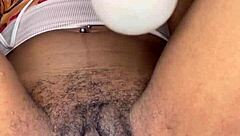 ebony slut teases hairy pussy to explosive edge
