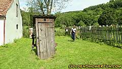 piss-drenched redhead takes massive cumshot in wild outdoor group scene