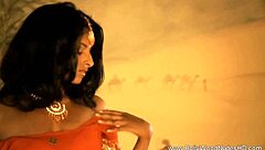 exotic asian dancer teases with sensual striptease