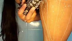 what if this horny colombian squirts wildly in the shower with her dildo?