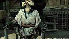 Bound beauty squirms in tight bondage ropes for intense fetish pleasure