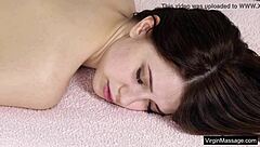 Lesbian massages Russian teen virgin's oiled pussy to orgasm