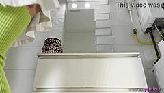 college brunette flashes panties under miniskirt in bathroom