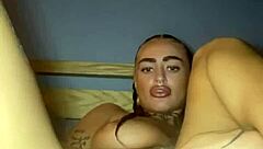 tattooed goth babe fingers her tight pussy till she squirts raw