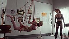 Bound Rebel Rhyder sucks cock eats ass in kinky BDSM threesome