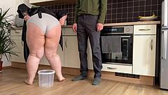 milf spreads fat ass cheeks wide while peeing in standing doggy position