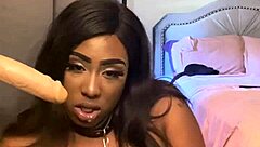 lexi butterfly spits and submits while sucking that massive cock off the wall