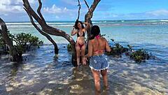 two sexy brazilians enjoying beach kisses outdoors