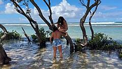 two sexy brazilians enjoying beach kisses outdoors