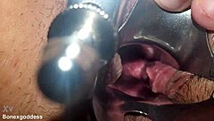 close-up speculum stretches pussy wide for intimate exam
