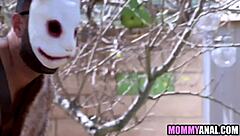 pagan milf in costume takes deep anal from masked stranger roughly