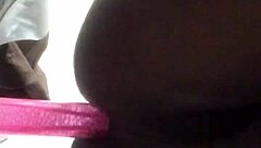 Sleek ebony shemale teases tight ass with toys