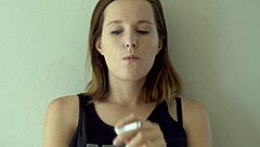 hot brunette smokes and teases voyeur style