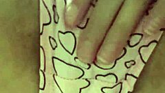 Brunette student fingers hairy pussy under classroom desk to cum