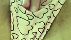 Brunette student fingers hairy pussy under classroom desk to cum