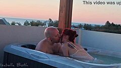 redhead sucks cock in hot tub