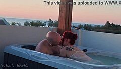 redhead sucks cock in hot tub