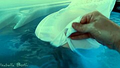 redhead sucks cock in hot tub