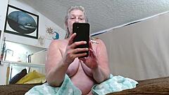 Mature beauty smokes fresh from the shower