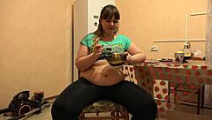 a plump bbw shakes her huge belly in leggings fetish