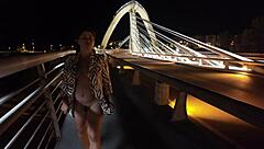 luscious milf struts braless pantyless on bridge flashing huge natural tits