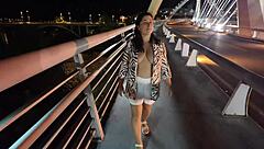 luscious milf struts braless pantyless on bridge flashing huge natural tits